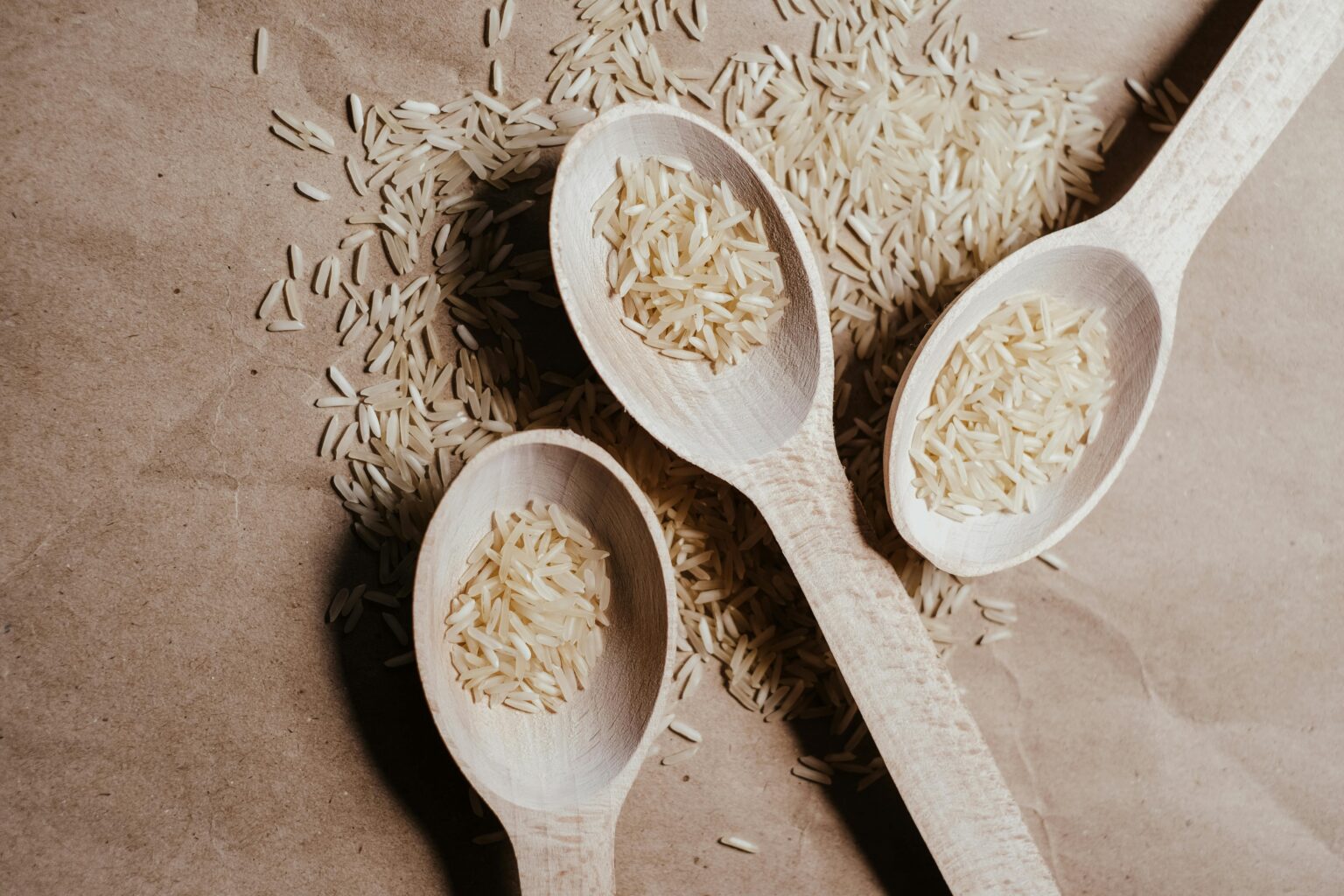 A White Rice on a Wooden Spoons