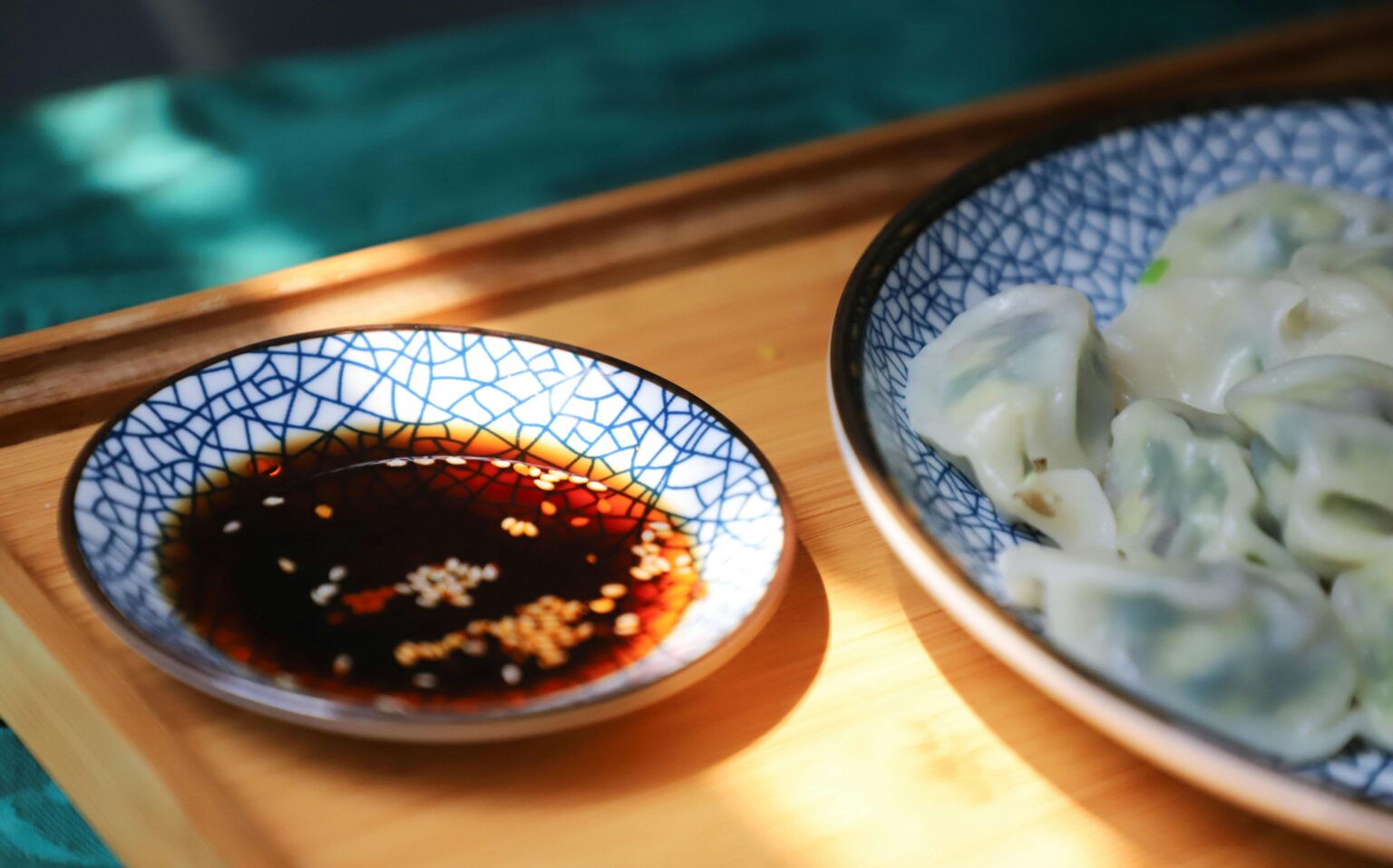 Round Blue Saucer Filled With Soy Sauce