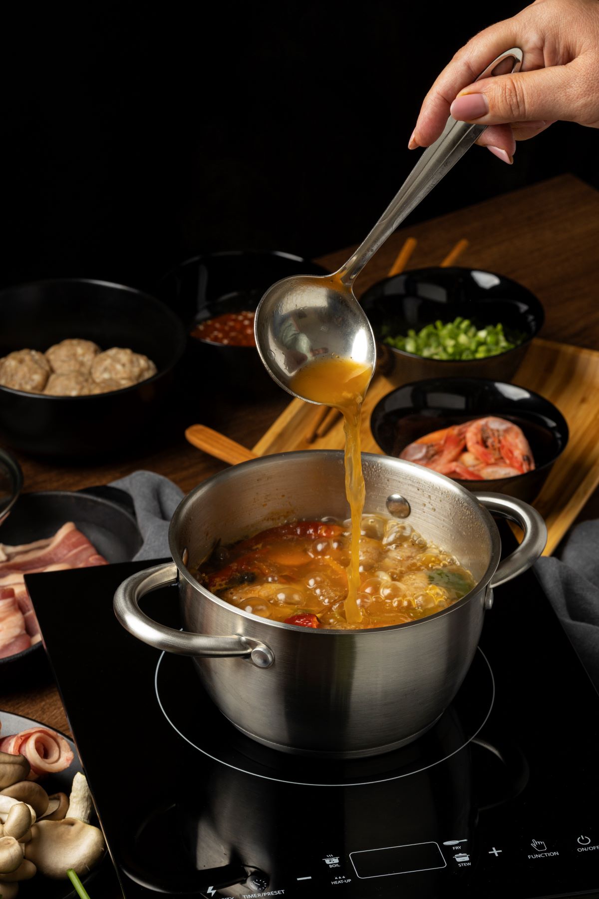 Pouring Liquid in Stew